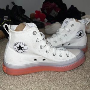 Converse shoes, white. They don’t fit me.